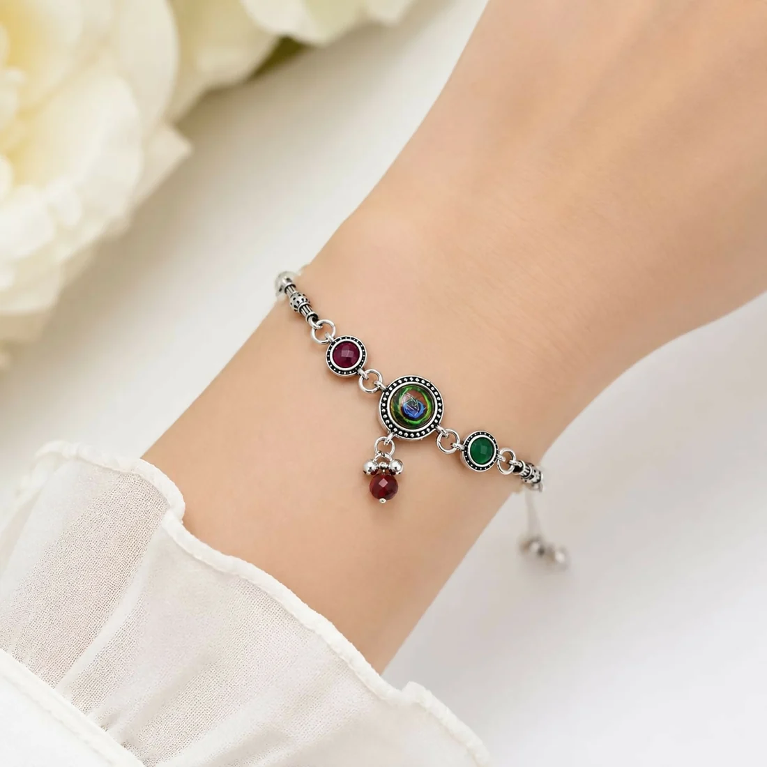 Antique Silver Adjustable Bracelet featuring Peacock Eye Cabochon, Maroon & Green Side Stones, & Bead Dangles